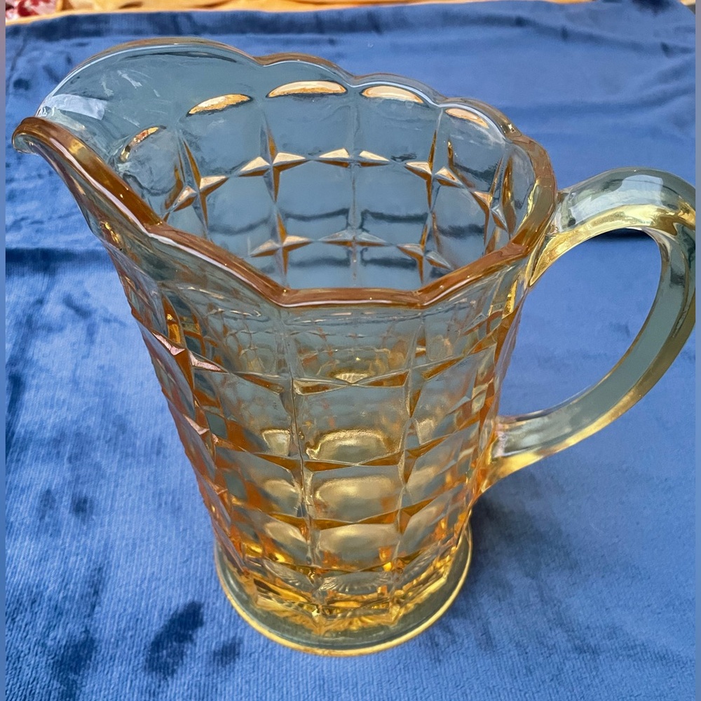 Vintage yellow glass pitcher. Heavy (can’t bundle). No chips, cracks or flaws.